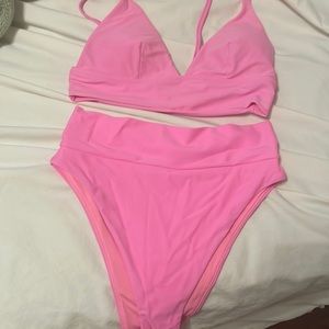 Pink triangle bikini top and high waisted swim bottom